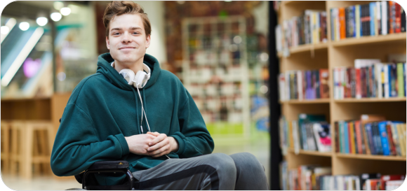 person in wheelchair is smilling